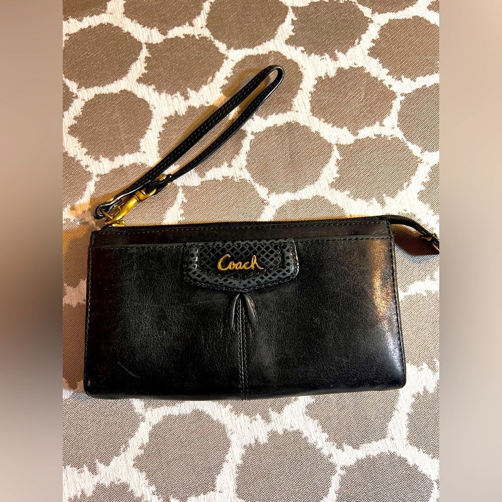 Vintage Coach Madison Black Leather Wristlet
With wristlet strap.